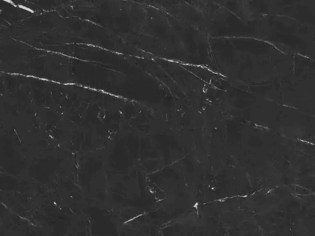 Black granite countertop in a modern kitchen